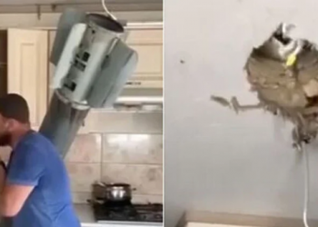 Muškarac se bezbrižno brije dok mu dio rakete visi u kući (VIDEO)